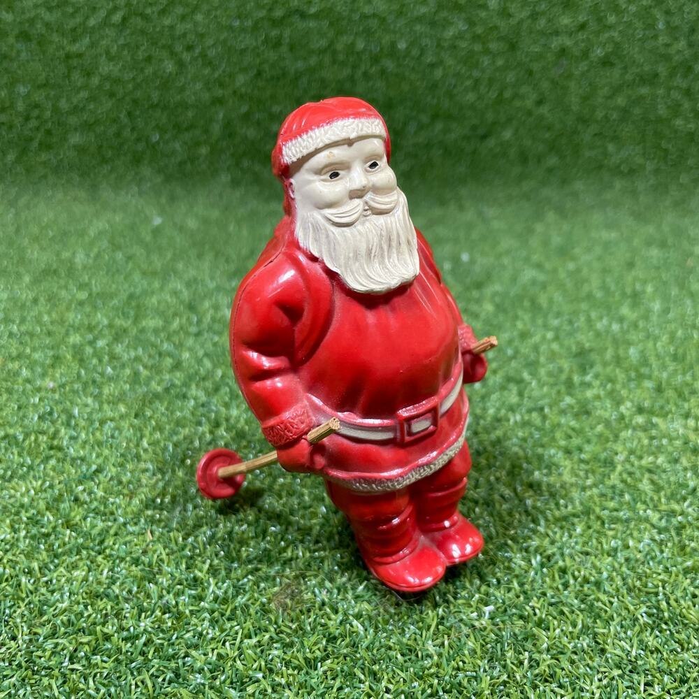 Vintage Small Celluloid Santa Claus with Ski Poles Christmas Figure